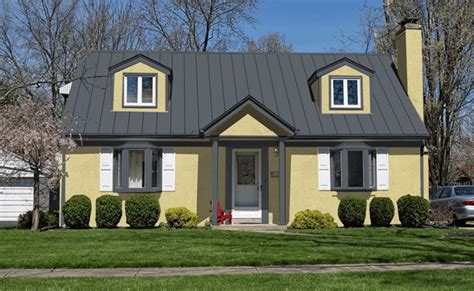 yellow house with gray metal roof|exterior house colors brown roof.